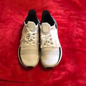 White and black adidas ultra boost